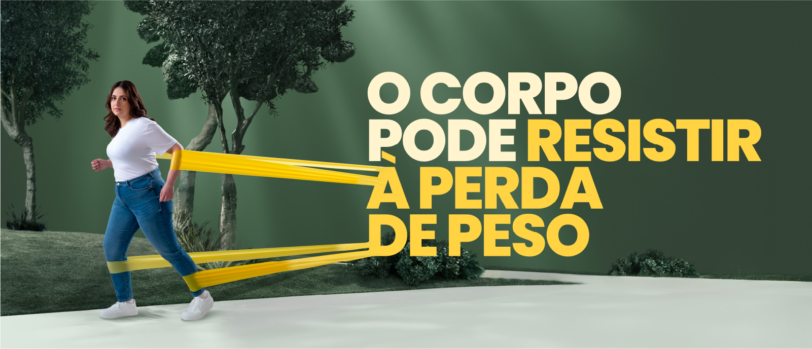 Uma mulher com obesidade a andar num parque, fica no mesmo lugar devido às faixas de resistência, ligadas à frase "O corpo pode resistir à perda de peso".